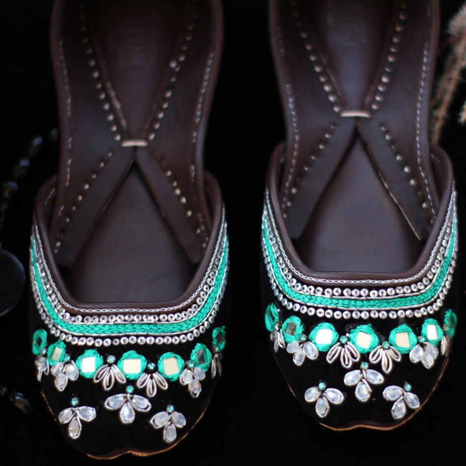 Alluring pair of khussas in turquoise and black combination (Genuine Leather)