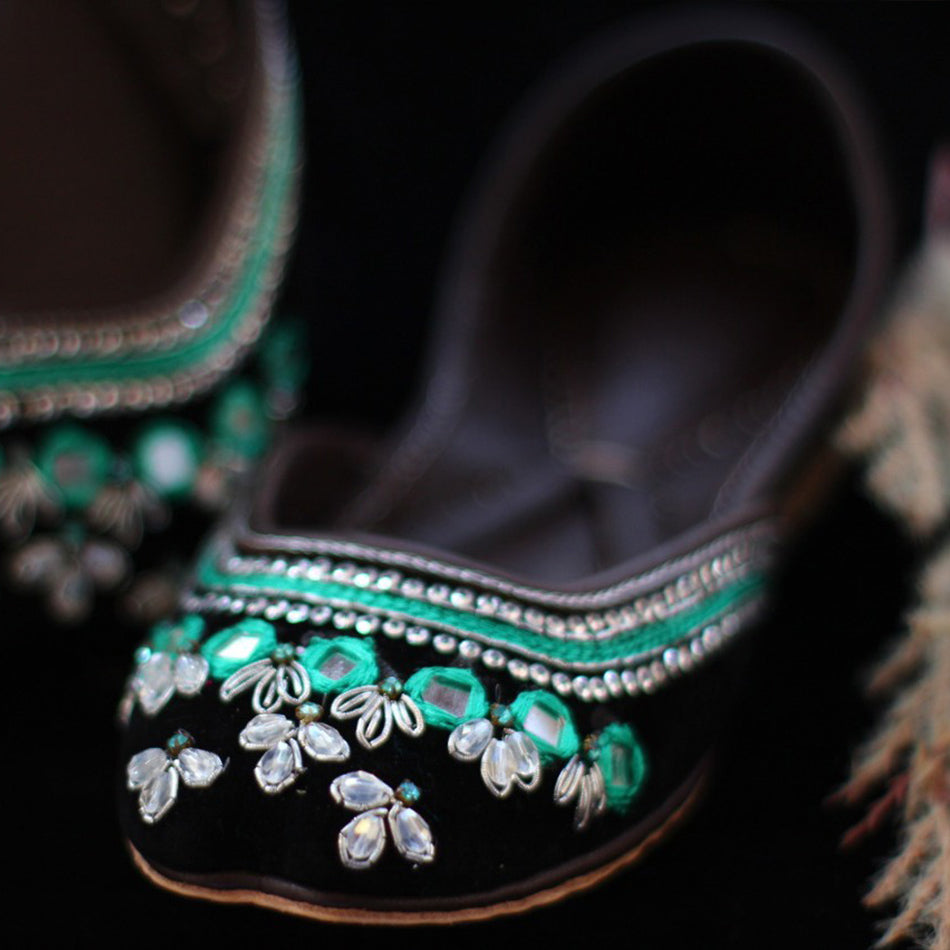 Alluring pair of khussas in turquoise and black combination (Genuine Leather)