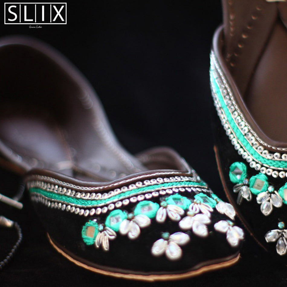 Alluring pair of khussas in turquoise and black combination (Genuine Leather)