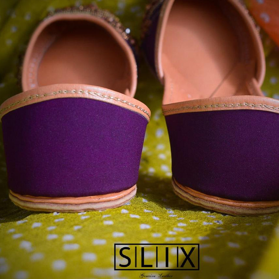 A Breathtaking Pair of Khussa with beads and Stone on a magenta base (Pure Leather)