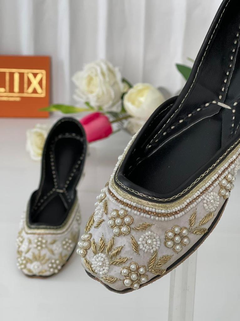 Decent White Color Khussas with Golden Hand Embroidered Flower with Pearls in Pure Leather